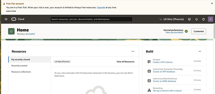 这是一个Oracle Cloud的仪表盘截图，显示了“Home”页面，其中包含了“Resources”和“Build”两个部分，并提示用户当前处于免费试用期。 (zhè shì yīgè Oracle Cloud de yíbiǎo pán jiétú, xiǎnshì le “Home” yèmiàn, qízhōng bāohánle “Resources” hé “Build” liǎng gè bùfen, bìng tíshì yònghù dāngqián chǔyú miǎnfèi shìyòng qī.) (由 AI 生成标题)